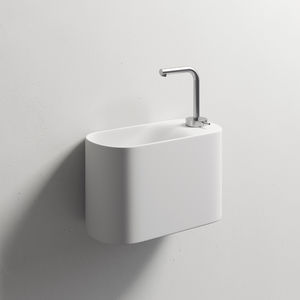 lavandino sospeso / ovale / in Solid Surface / in resina