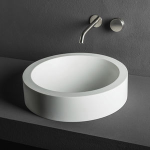 lavabo da appoggio / tondo / in Corian® / moderno