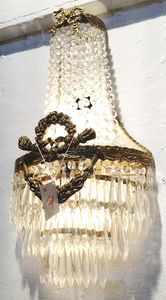 applique in stile Luigi XVI