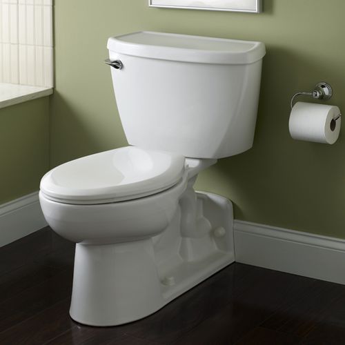 WC da appoggio - YORKVILLE - AMERICAN STANDARDS - in porcellana / per bagno pubblico / con maniglia a leva