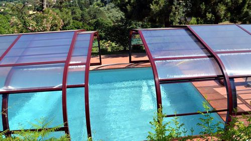 Copertura per piscina alta - IBIZA - abrisol - telescopica / in metallo / in policarbonato