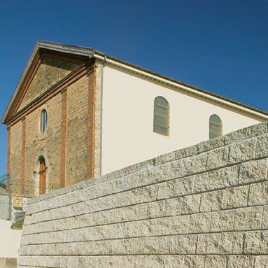 Muro di contenimento in calcestruzzo - DARMUR - ALKERN - prefabbricato / per recinzione di giardino / finitura pietra
