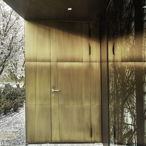 Porta d'ingresso - SWITZERLAND - AIR-LUX - in alluminio / in ottone / battente