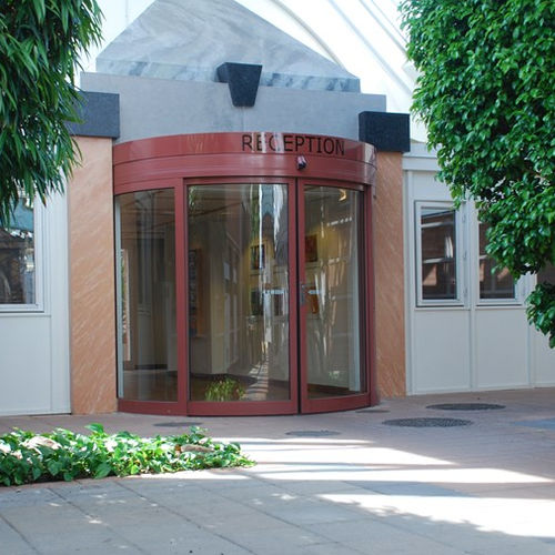 Porta d'ingresso - CURVED - ASSA ABLOY - in metallo / scorrevole / vetrata