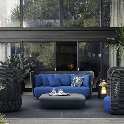 Divano contemporaneo - Bay - B&B Italia - da giardino / in tessuto / con braccioli