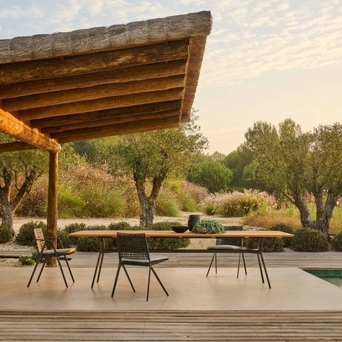 Tavolo da pranzo contemporaneo - BRANCH - Tribù - in alluminio / in teak / con supporto in ghisa di alluminio