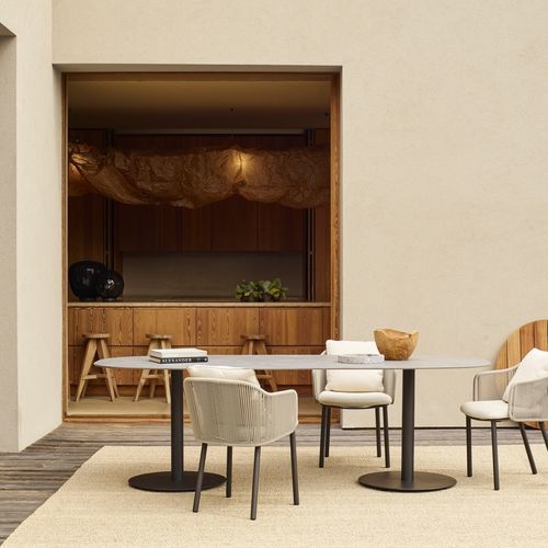 Tavolo da pranzo contemporaneo - T-TABLE  - Tribù - in pietra lavica / con supporto in acciaio inossidabile / ovale