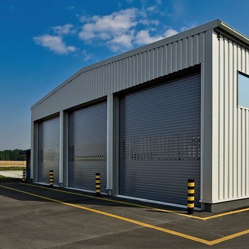 Porta industriale avvolgibile - BR-100  - WISNIOWSKI - in alluminio / automatica / termoisolante