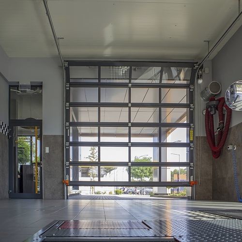 Porta industriale sezionale - MakroPro 2.0 series - WISNIOWSKI - in metallo / automatica / di sicurezza
