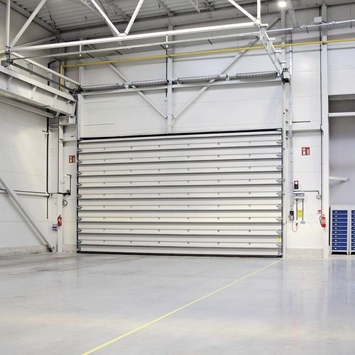 Porta industriale sezionale - MakroTherm series - WISNIOWSKI - in acciaio / automatica / di sicurezza