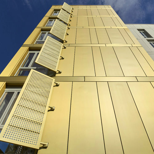 Rivestimento di facciata in zinco - elZinc RAINBOW&reg; GOLD - ASTURIANA DE LAMINADOS - in pannelli / riciclabile / di lunga durata