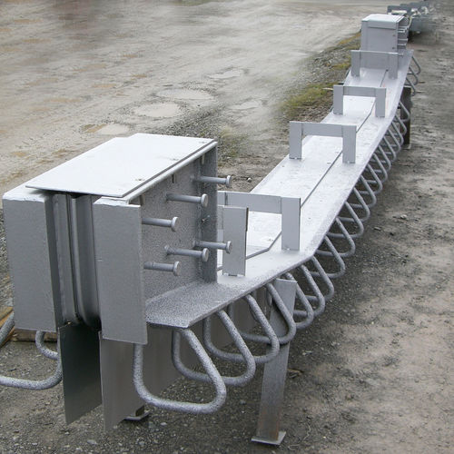 Giunto di dilatazione in elastomero - TENSA-RAIL RSU - Mageba - in acciaio / per costruzione di ponti / unicellulare