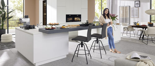 Cucina contemporanea - Musterring - in legno laccato / con isola / a L