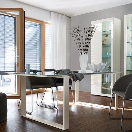 Tavolo da pranzo contemporaneo - ET 19 - NOW! By Hülsta - in vetro laccato / in acciaio con rivestimento a polvere / con supporto in acciaio inossidabile
