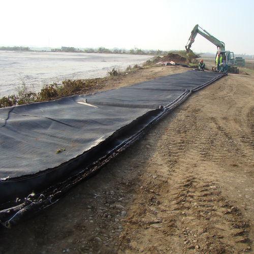 Geotessile tessuto - Basetrac® - Huesker - sintetico / per filtrazione / di fondazione