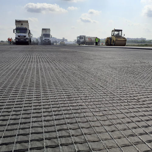 Geogriglia di consolidamento - HaTelit® - Huesker - per strada / per lavori stradali / per strade