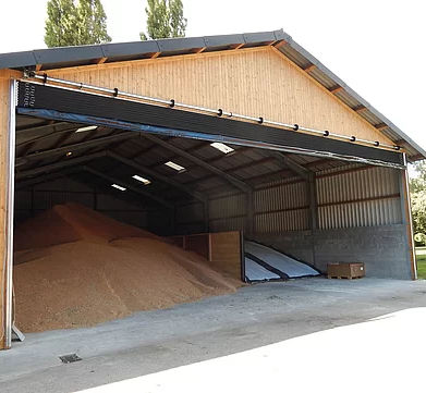 Porta industriale avvolgibile - Lubratec® - Huesker - in gomma / in alluminio / di sicurezza