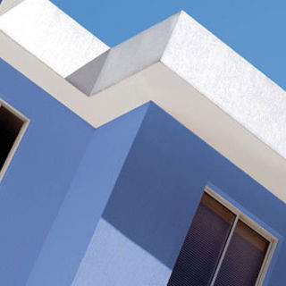 Intonaco di protezione - ELASTRONG GUM - OIKOS colore e materia per l'architettura - per esterni / per muro / per facciata