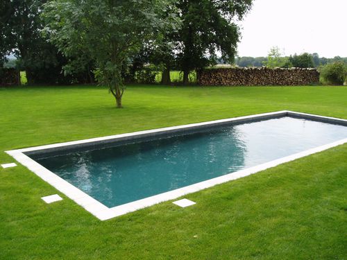 Piscina da esterno - UNIQUE - GUNCAST SWIMMING POOLS - interrata / in calcestruzzo