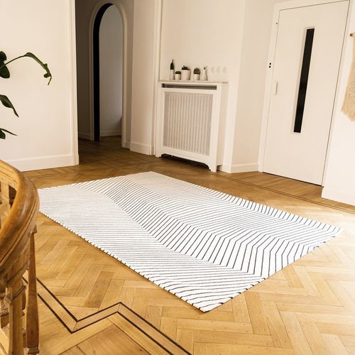 Tappeto contemporaneo - SAN ANDREAS - Louis De Poortere - con motivi geometrici / in poliestere / in PET riciclato