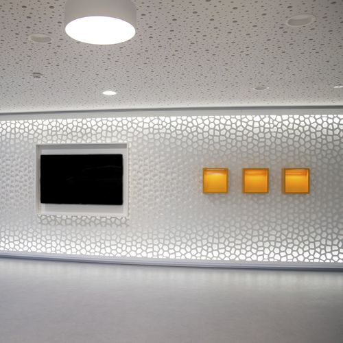 Pannello decorativo da parete - ENBW ELLWANGEN - Bruag Design Factory AG - retroilluminato / in MDF / perforato