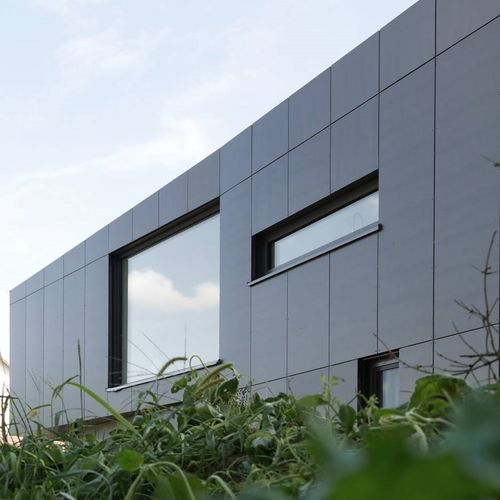 Rivestimento di facciata in pannelli - CELLON - EFH OEHNINGEN - Bruag Design Factory AG - in composito / in HPL / liscio