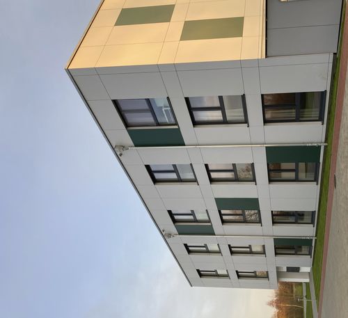 Facciata ventilata in HPL - CELLON CAMPUS HEIDE - Bruag Design Factory AG - in fogli / liscia / colorata