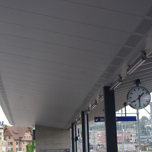 Pannello acustico per controsoffitto - TRAIN STATION SCHAFFHAUSEN - Bruag Design Factory AG - in fibra di legno / rettangolare / perforato