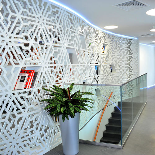 Pannello decorativo per parete - SWISS EMBASSY ABU DHABI - Bruag Design Factory AG - in MDF / perforato