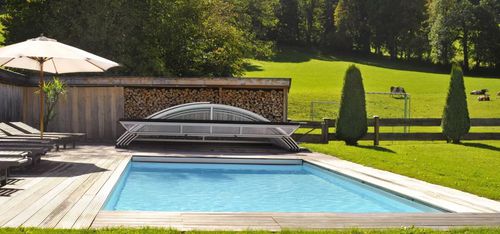 Copertura per piscina a mezza altezza - Capena - telescopica / con azionamento manuale / per piscina interrata