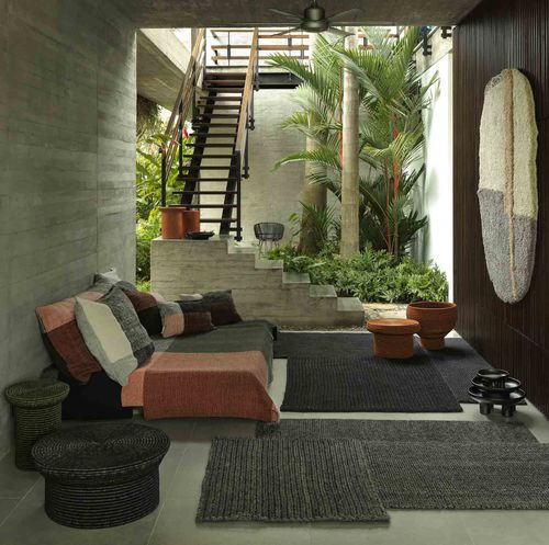 Tavolo d'appoggio contemporaneo - LA CHE - Ames design - in fibra vegetale / con supporto in rattan / rotondo