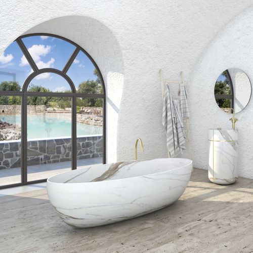 Vasca da bagno ovale - VENICE - KREOO - ad isola / per ambiente abitativo / in pietra