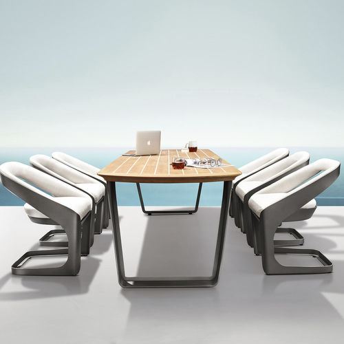 Tavolo da pranzo contemporaneo - ONDA - Higold - in teak / con supporto in alluminio / a slitta