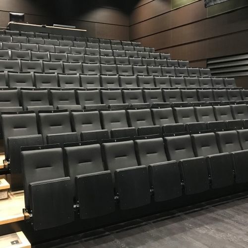 Sedia per auditorium contemporanea - Monza - Jezet Seating - da interno / in tessuto ignifugo / pieghevole