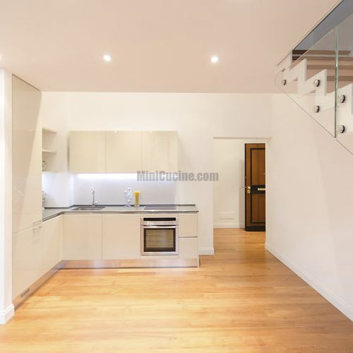 Cucina contemporanea - CUCINA SU MISURA - MiniCucine.com - in legno laccato / a L / con impugnature