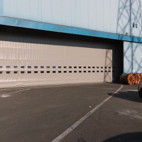 Porta industriale ad impacchettamento - SAILDOOR® - Apostoli Daniele - in acciaio galvanizzato / in PVC / a prova di vento