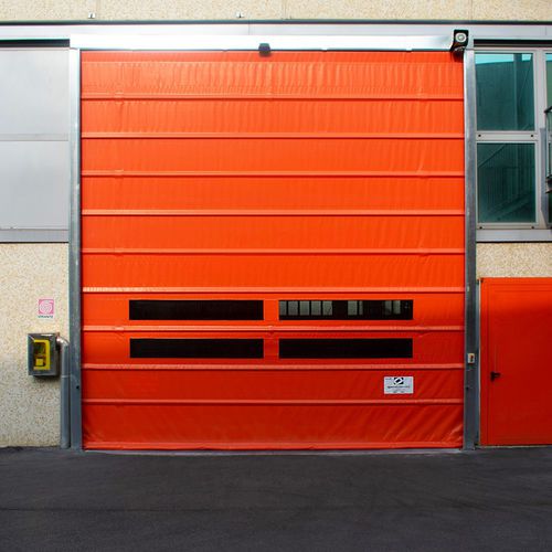 Porta industriale ad impacchettamento - E12 - Apostoli Daniele - in acciaio galvanizzato / in PVC / automatica