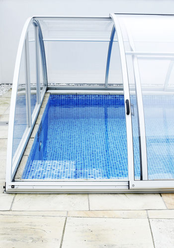 Copertura per piscina a mezza altezza - STELLA COMFORT - Gullberg & Jansson AB - scorrevole / in alluminio / a motore