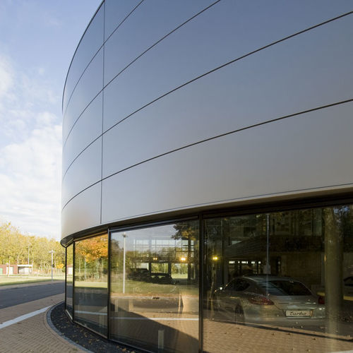 Rivestimento di facciata in pannelli - GRANITE® PVDF  - ArcelorMittal Europe – Flat Products - in acciaio / in composito / verticale