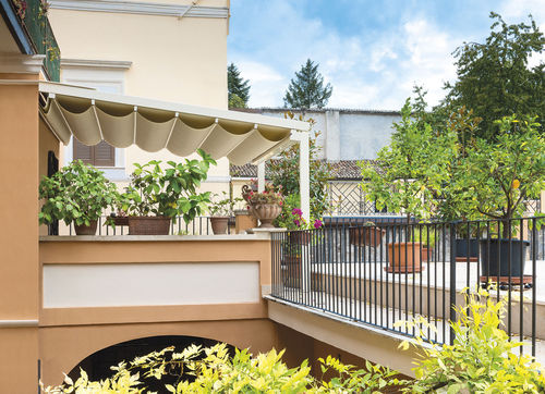 Pergola addossata - PARTERRE : SANREMO - Frigerio Living - in alluminio / con copertura scorrevole in tela PVC