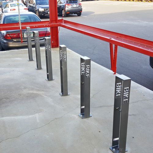 Rastrelliera per biciclette a pavimento - PIERCE™  - Madrax - con sistema di sicurezza / per spazi pubblici / in acciaio galvanizzato