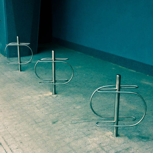 Rastrelliera per biciclette a pavimento - SPIRAL 05.022 - ZANO Street Furniture - design originale / con sistema di sicurezza / per spazi pubblici