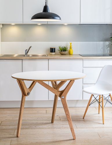 Tavolo contemporaneo - Boulon Blanc - in laminato / con supporto in quercia / rotondo