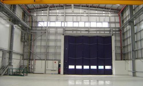 Porta industriale a libro - ESAVIAN : TYPE 1200 - Jewers Doors - in alluminio / a tenuta stagna / per hangar