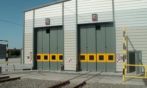 Porta industriale a libro - PHOENIX : SWIFT BI-FOLD - Jewers Doors - in metallo / antipanico / automatica