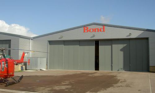 Porta industriale scorrevole - PHOENIX : KINGFISHER - Jewers Doors - in metallo / di sicurezza / ad alte prestazioni