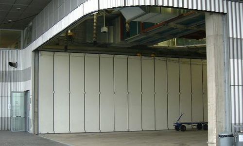 Porta industriale scorrevole - THE LOWRY - Jewers Doors - in alluminio / per hangar / da interno