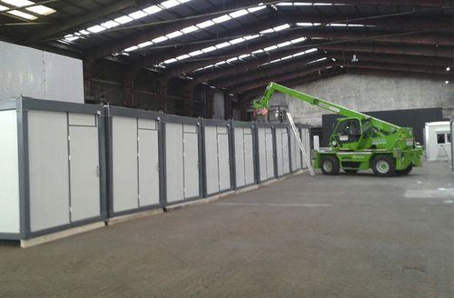 Edificio container - APEC Smart Steel Structures - in acciaio / su ossatura metallica / per alloggi collettivi