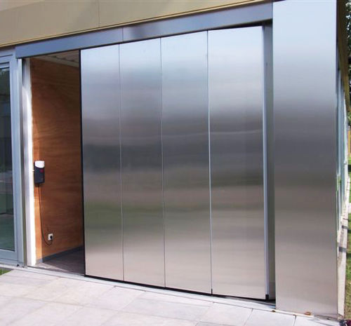 Porta sezionale laterale per garage - AVALON : EG - Guttomat - in acciaio / automatica