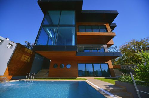 Rivestimento di facciata a doghe - NOVATHERMOWOOD EXTERIOR CLADDING: IROKO - novawood - in iroko / FSC / in lamiera grecata